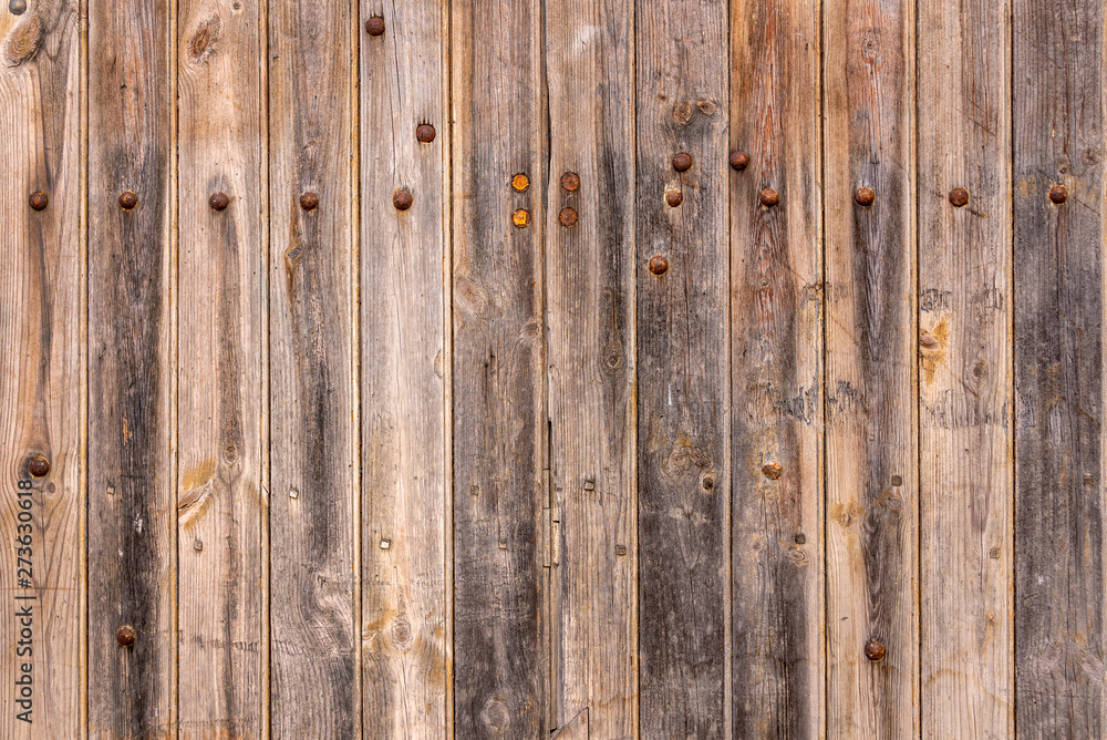 Naklejka premium Old wooden planks texture with rusty nails, vintage background