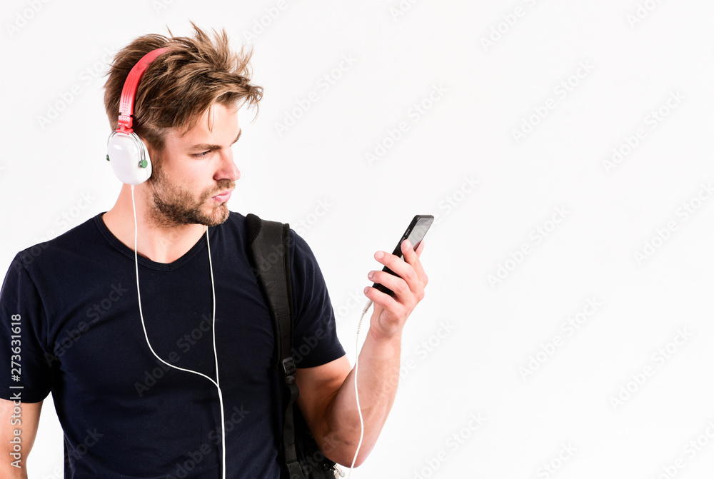 Enjoy sound headphones. Music gadget. Musical accessory gadgets. Man listen  music online headphones and smartphone. Modern technology. Radio wave. Pop  music. Mp3 player concept. Music application foto de Stock | Adobe Stock