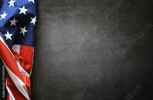 Fényképezés American flag on a black background. Space for text.
