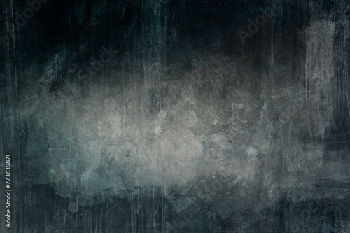 Dark blue grungy background with spotlight background