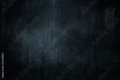 Dark blue grungy background or texture