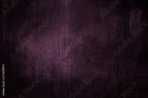 Dark purple grungy background or texture