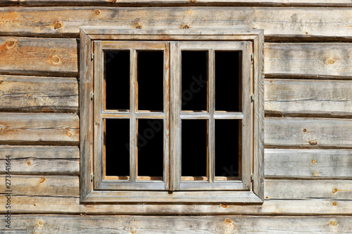 Rustic style window in wooden village rural home wall