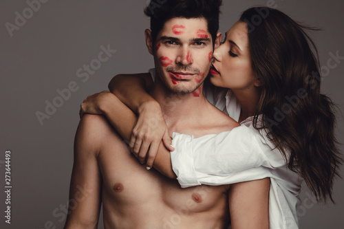 Foto Passionate couple on grey background