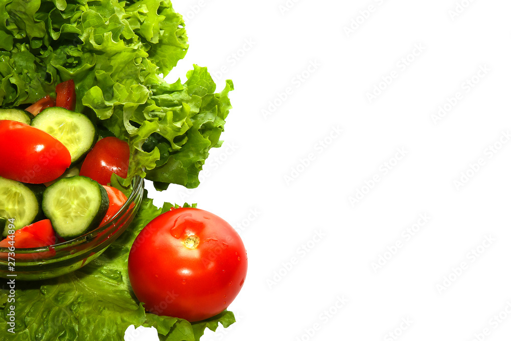 Close-up of colorful organic vegetables on white background.