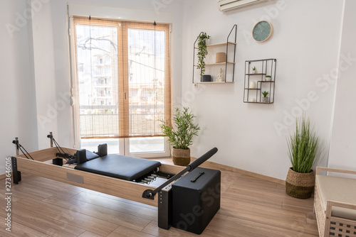 Pilates studio room with reformer beds