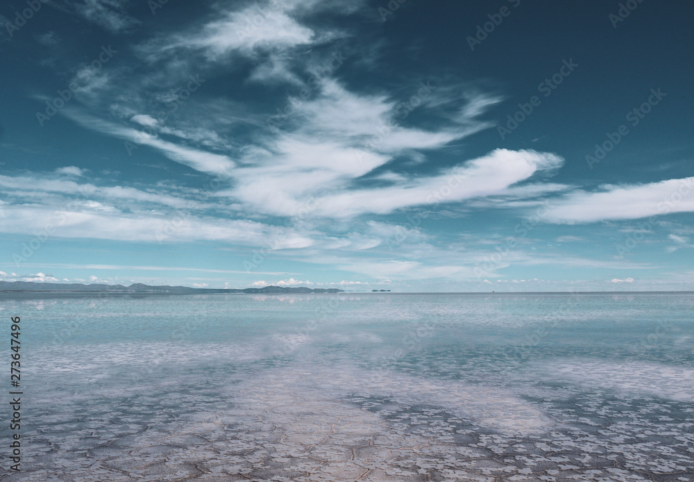 Endless landscapes with reflection like mirror of sky in Salar de Uyuni, Bolivia Endless landscapes with reflection like mirror of sky in Salar de Uyuni, Bolivia