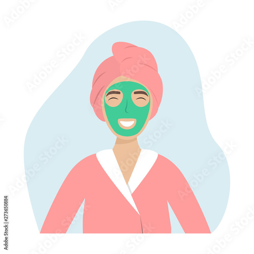 A girl with a towel on her head and a facemask. SPA. Beauty procedure.