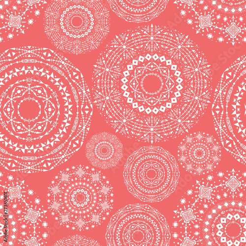Ethnic seamless pattern with tribal ornaments. Boho geometrical pattern. Living coral color