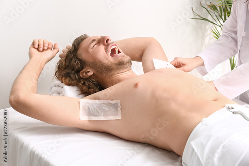 Young man suffering from pa...