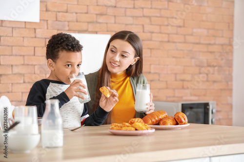 Young mother with adopted s...