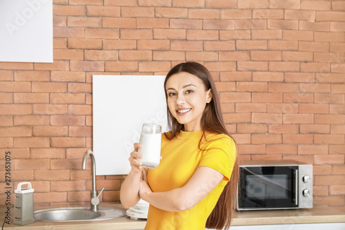Beautiful woman drinking ta...