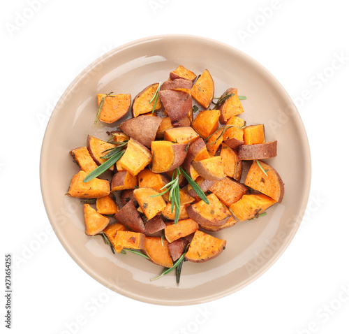 Plate with tasty cooked sweet potato on white background