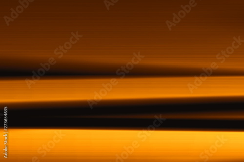 Abstract blurred background gradient texture with gold lines and curves and striped pattern