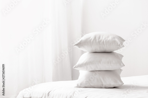 Fototapeta Naklejka Na Ścianę i Meble -  Soft pillows on cozy bed