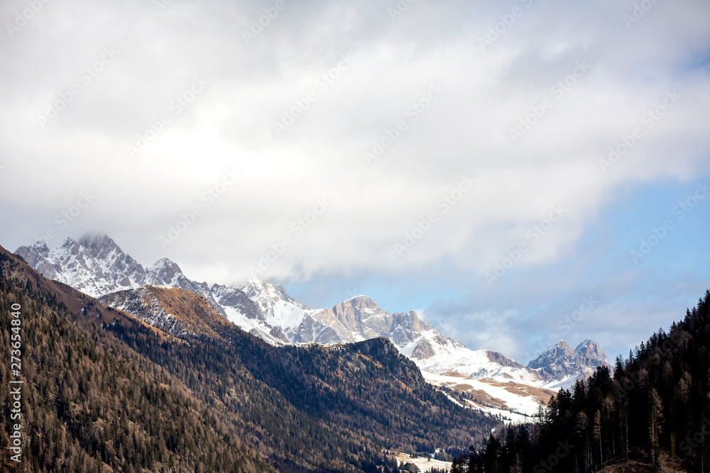 Snow-capped mountains in Trentino Alto Adige. Mountains in winter. Winter landscape in the Alps Mountains, Moena, Val di Fassa.
