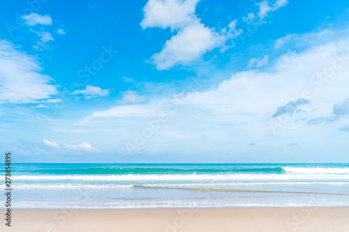 Beautiful tropical beach with blue sky and white clouds abstract texture background. Copy space of summer vacation and holiday business travel concept.