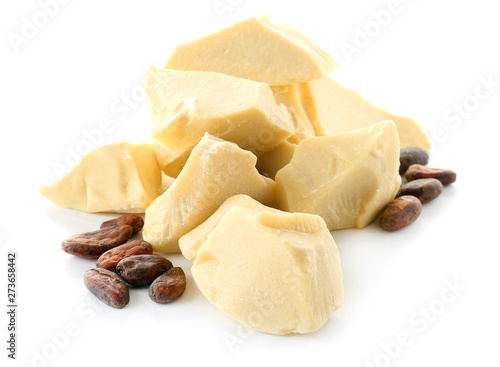 Pieces of cocoa butter on white background