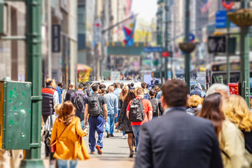 New York, streets. High buildings and crowd walking