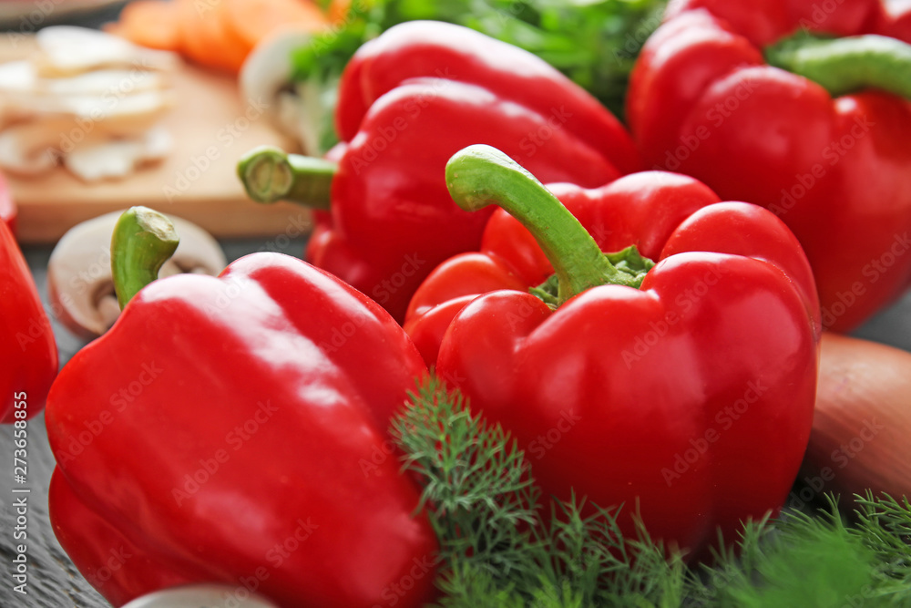 Ripe red peppers on table Ripe red peppers on table