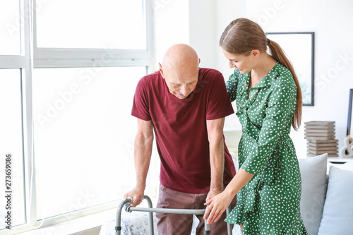 Young woman visiting her el...