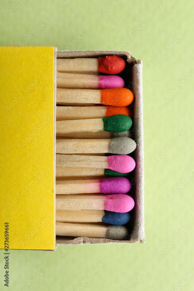 Box with matches on color background, closeup Box with matches on color background, closeup