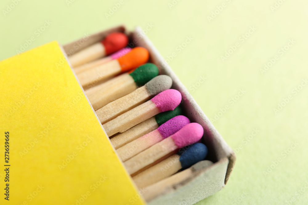 Box with matches on color background, closeup Box with matches on color background, closeup