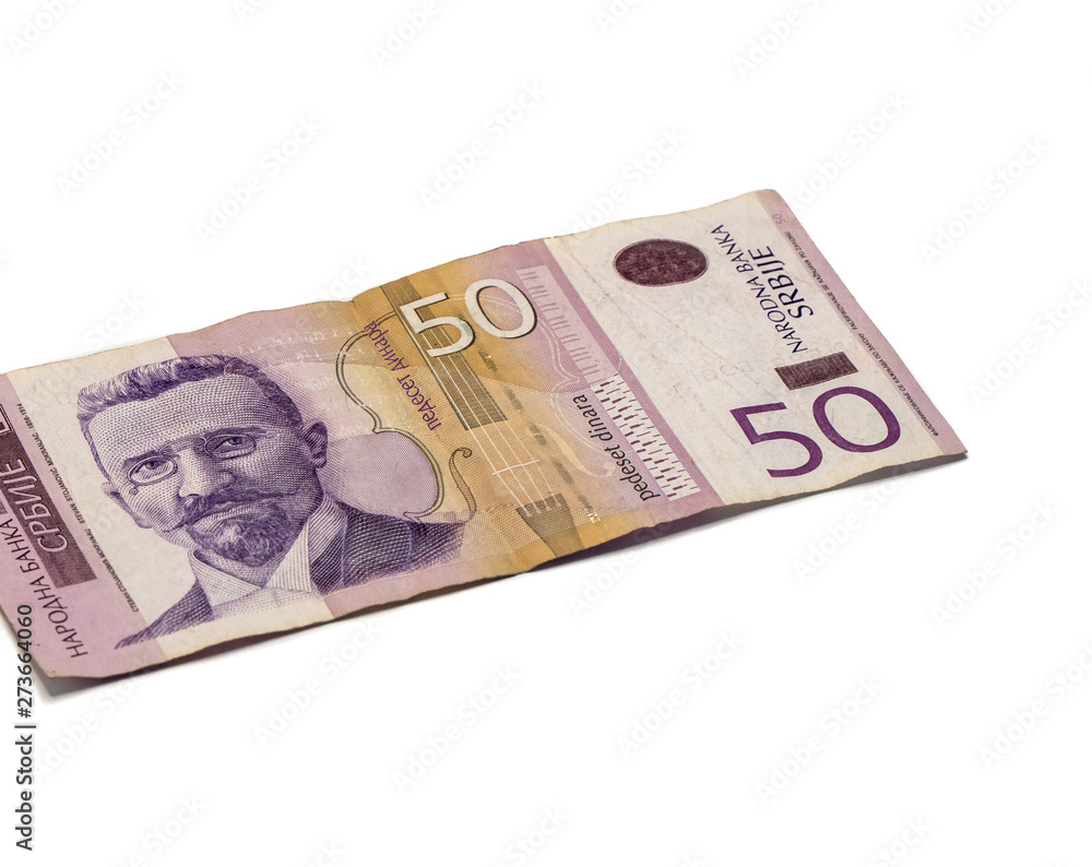 One banknote worth 50 Serbian Dinars with a portrait of violinist Stevan Mokranyats isolated on a white background One banknote worth 50 Serbian Dinars with a portrait of violinist Stevan Mokranyats isolated on a white background
