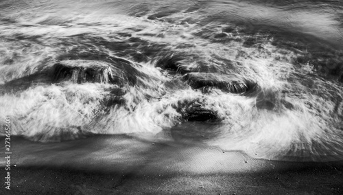 sea waves black and white beach