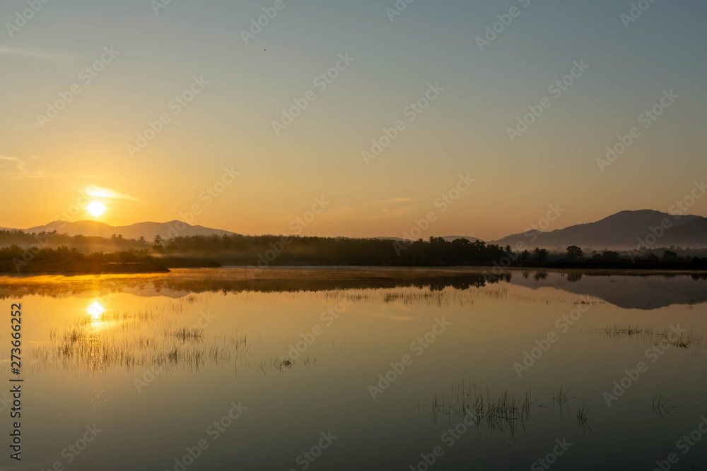 View at Ban Thong Suk Reservoir, Songkhla, Thailand at sunrise.
