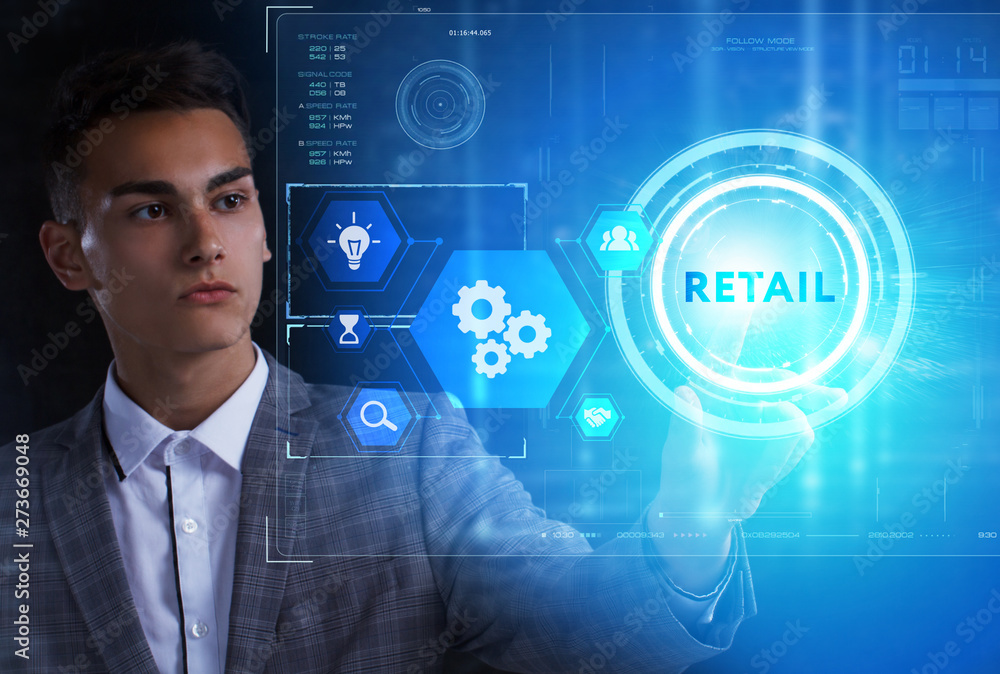 The concept of business, technology, the Internet and the network. A young entrepreneur working on a virtual screen of the future and sees the inscription: Retail The concept of business, technology, the Internet and the network. A young entrepreneur working on a virtual screen of the future and sees the inscription: Retail