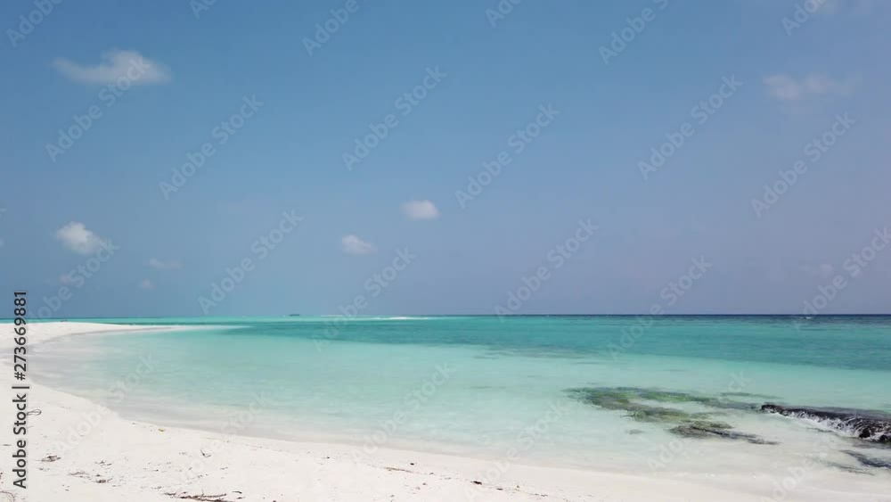 camera moving up from a pristine beach in the Philippines to the sky with some scattered clouds passing by camera moving up from a pristine beach in the Philippines to the sky with some scattered clouds passing by