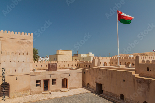 Flag at Al Ayjah Fort in Sur, Oman photo