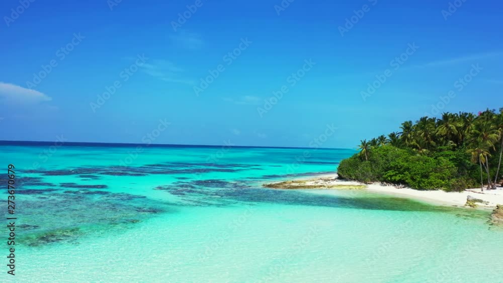 Tropical isle in Maldives, Beautiful Bright Colours, Green Trees. and Clear Sky. Tropical isle in Maldives, Beautiful Bright Colours, Green Trees. and Clear Sky.