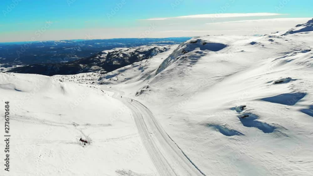 Flying over a beautiful mountain covered in snow. Flying over a beautiful mountain covered in snow.