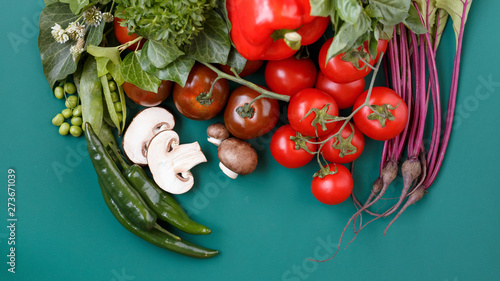 Top view of a various fresh vegetables organic food for healthy on dark rustic background with copy space for your text.