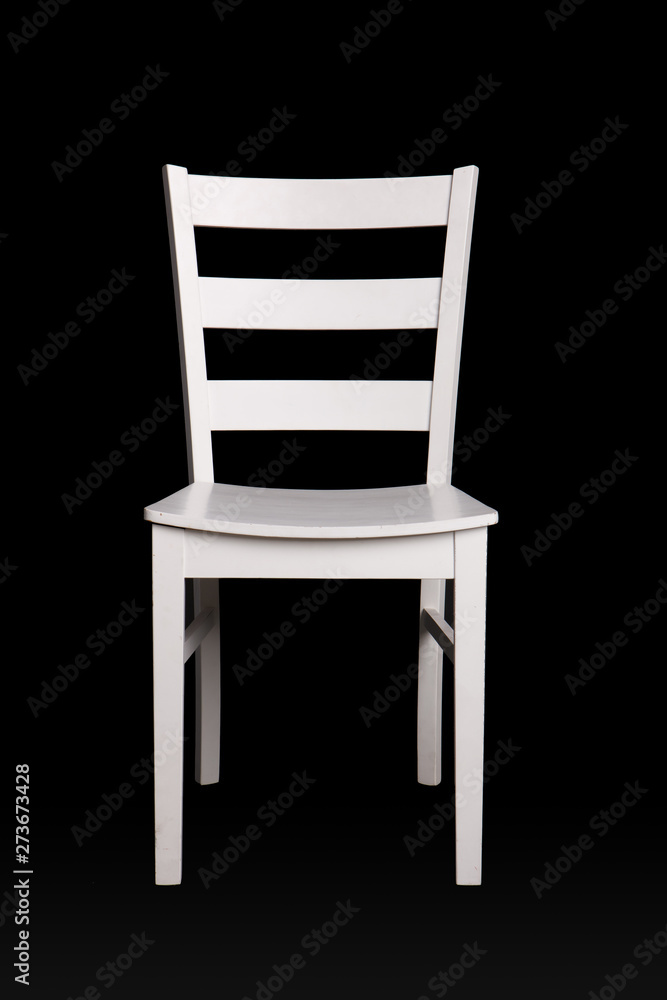 Modern white chair on black background.