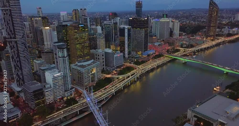 Aerial view of Brisbane city CBD riverside with highway passing by at night. Aerial view of Brisbane city CBD riverside with highway passing by at night.