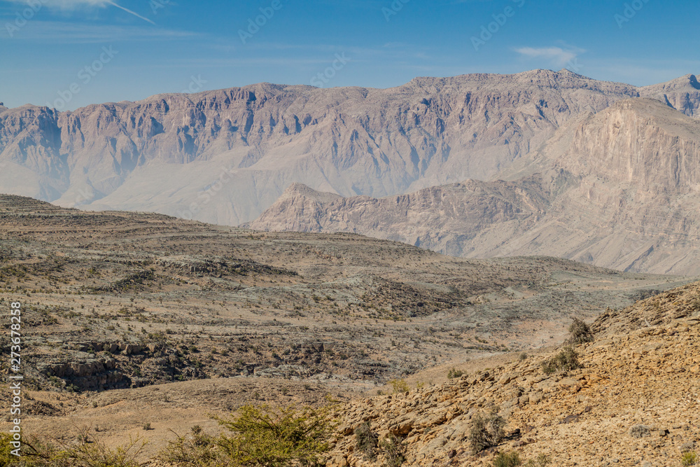 Wadi Ghul canyon in Hajar Mountains, Oman