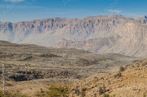 Wadi Ghul canyon in Hajar Mountains, Oman