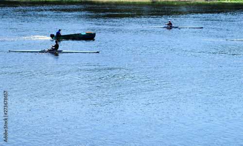 people boating on the river