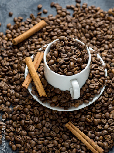 White coffee Cup filled with top quality roasted coffee beans