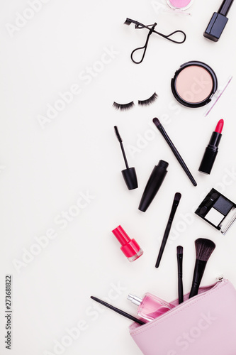 Fototapeta Naklejka Na Ścianę i Meble -  Woman makeup background with beauty products and cosmetics. Top view and flat lay style. .