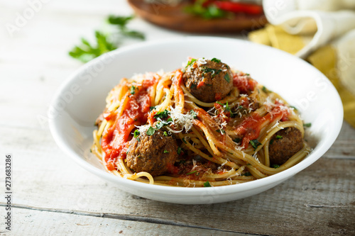 Homemade pasta with meatballs and tomato sauce