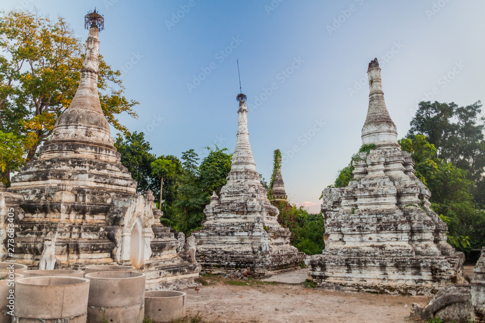 Old white stupas in Myauk Myo neighborhood of Hsipaw, Myanmar