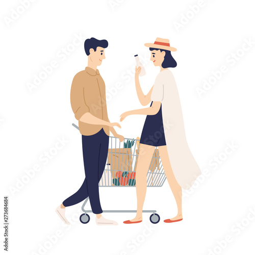 Cute funny young couple with shopping cart buying food at grocery store