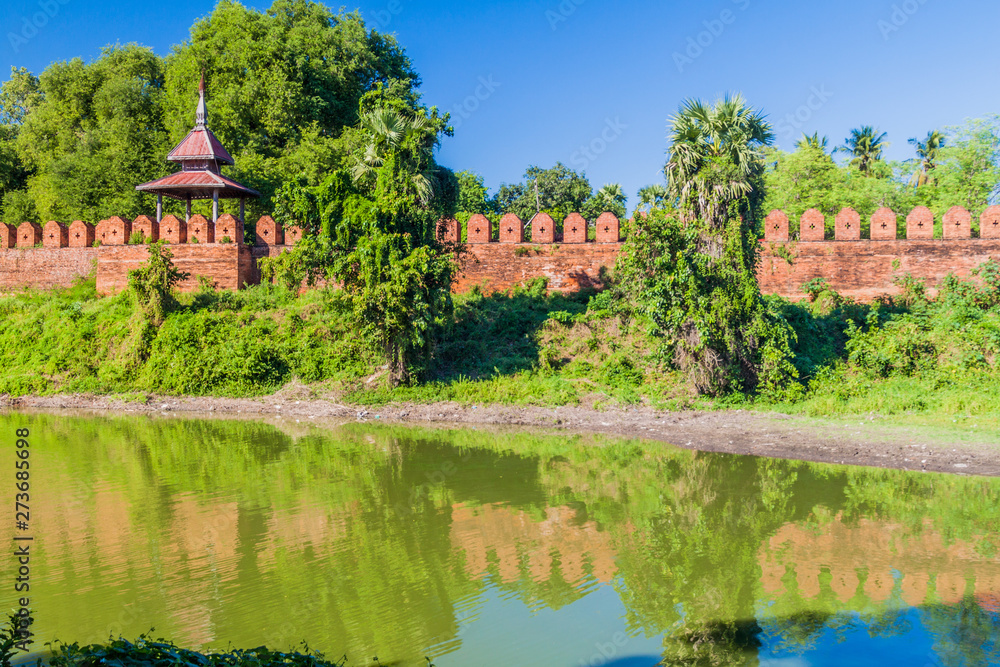 Walls and a moat of the ancient town Inwa (Ava) near Mandalay, Myanmar