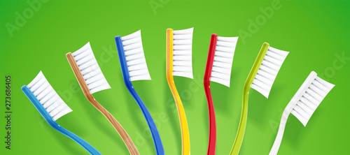 Toothbrush. Dental broom. Coloured set for tooth hygiene. Stomatology prophylaxis equipment. Green background. Eps10 vector illustration.