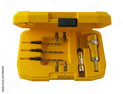 .The countersink set consists of a nozzle for a quick change of the drill bit and a set of interchangeable countersink drills. Drill for screwdriver. Woodworking. photo