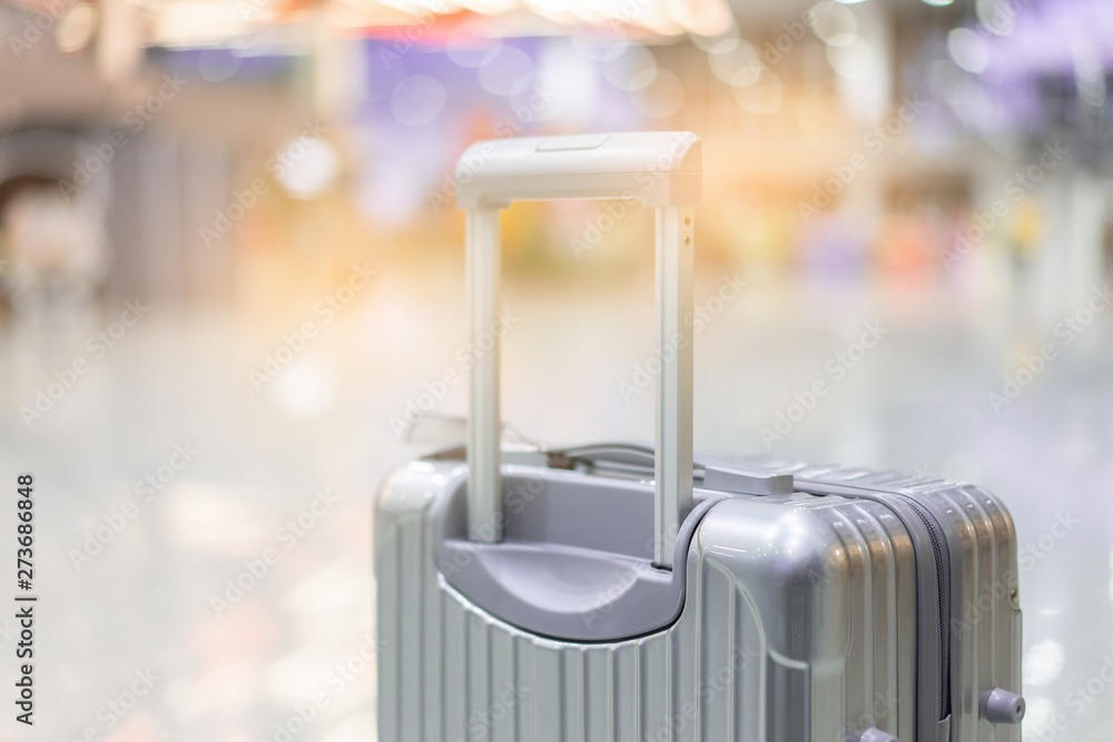 Φωτογραφία luggage holder on suitcase or bag with TRAVEL INSURANCE ,traveling luggages in a